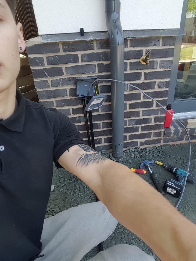Apprentice Electrician Installing Outside Socket - Histon Cambridge